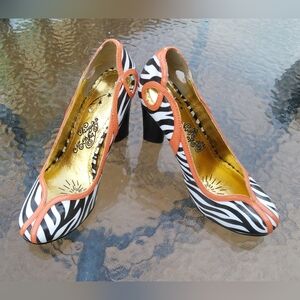 Naughty Monkey Zebra Heels with Bold Orange Trim